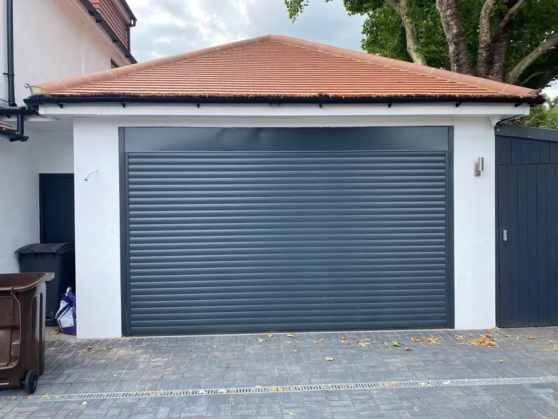 Newly installed garage door on a brick built double garage in Surrey